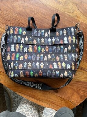 Harveys Black Messenger Bag with Multicolor Action Figure Print